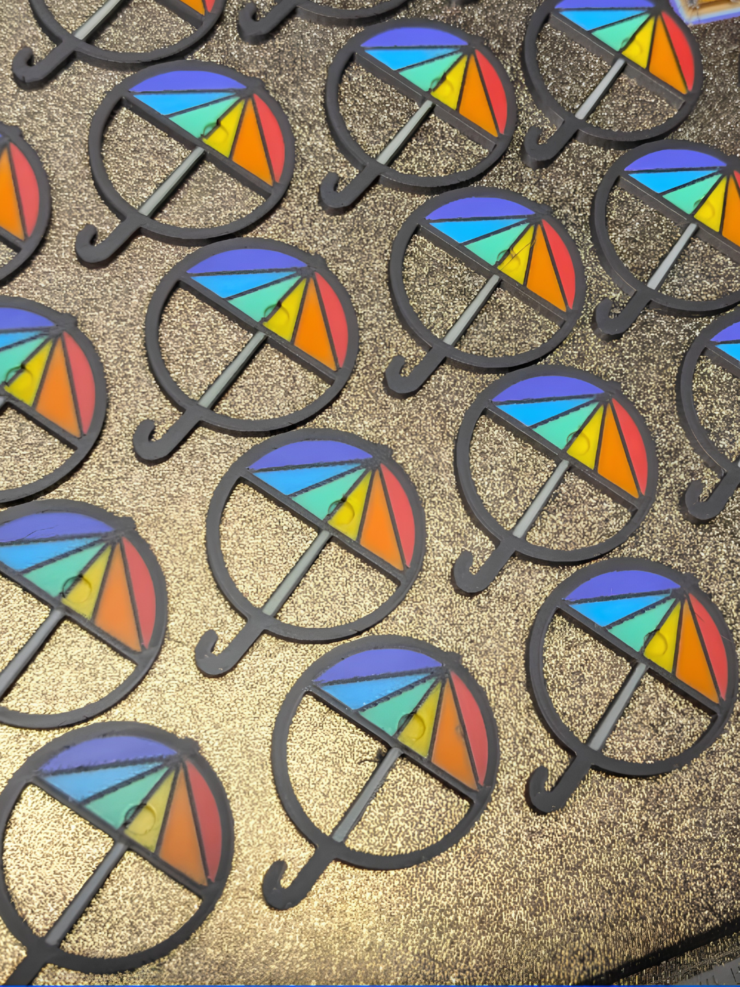 Colorful rainbow umbrella magnets made by Jason Morris of Dragonfoot3D — available at First Saturdays in Ridgefield