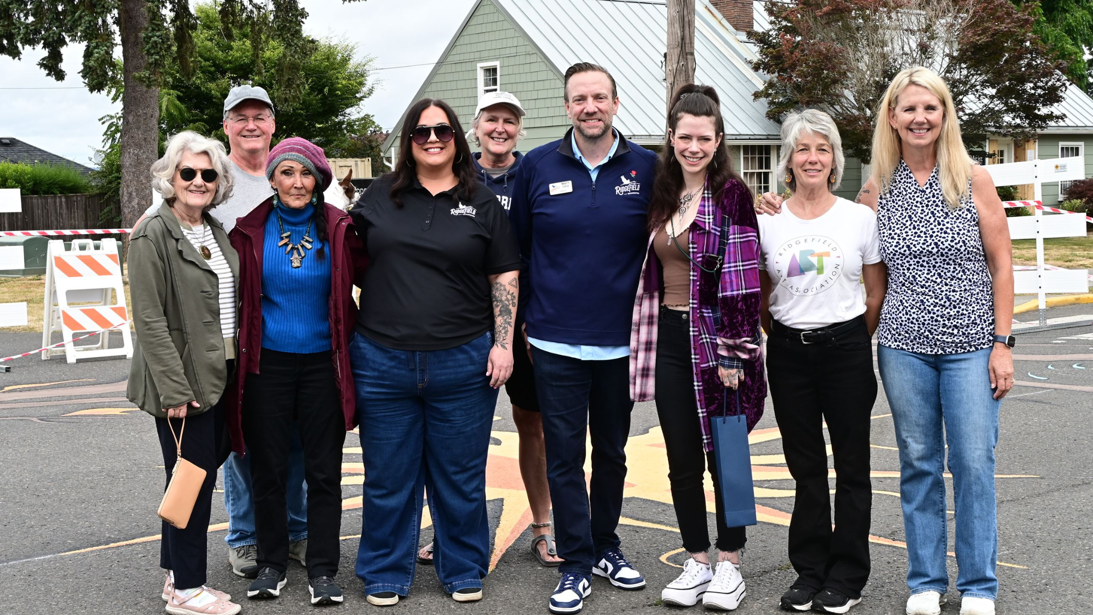 Ridgefield Mayor Matt Cole, Councilmember Meghan Hamilton, artist Olivia Bonebrake and volunteers at the street mural dedication