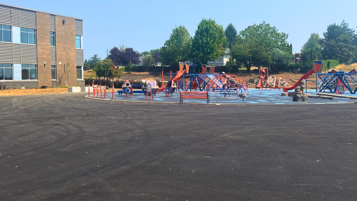 All-abilities playground and coyote climbing structure at Sunset Ridge Elementary