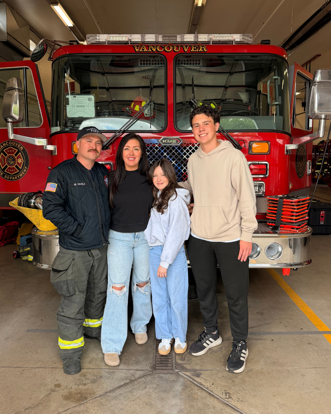 Katie Favela with her firefighter husband and their children