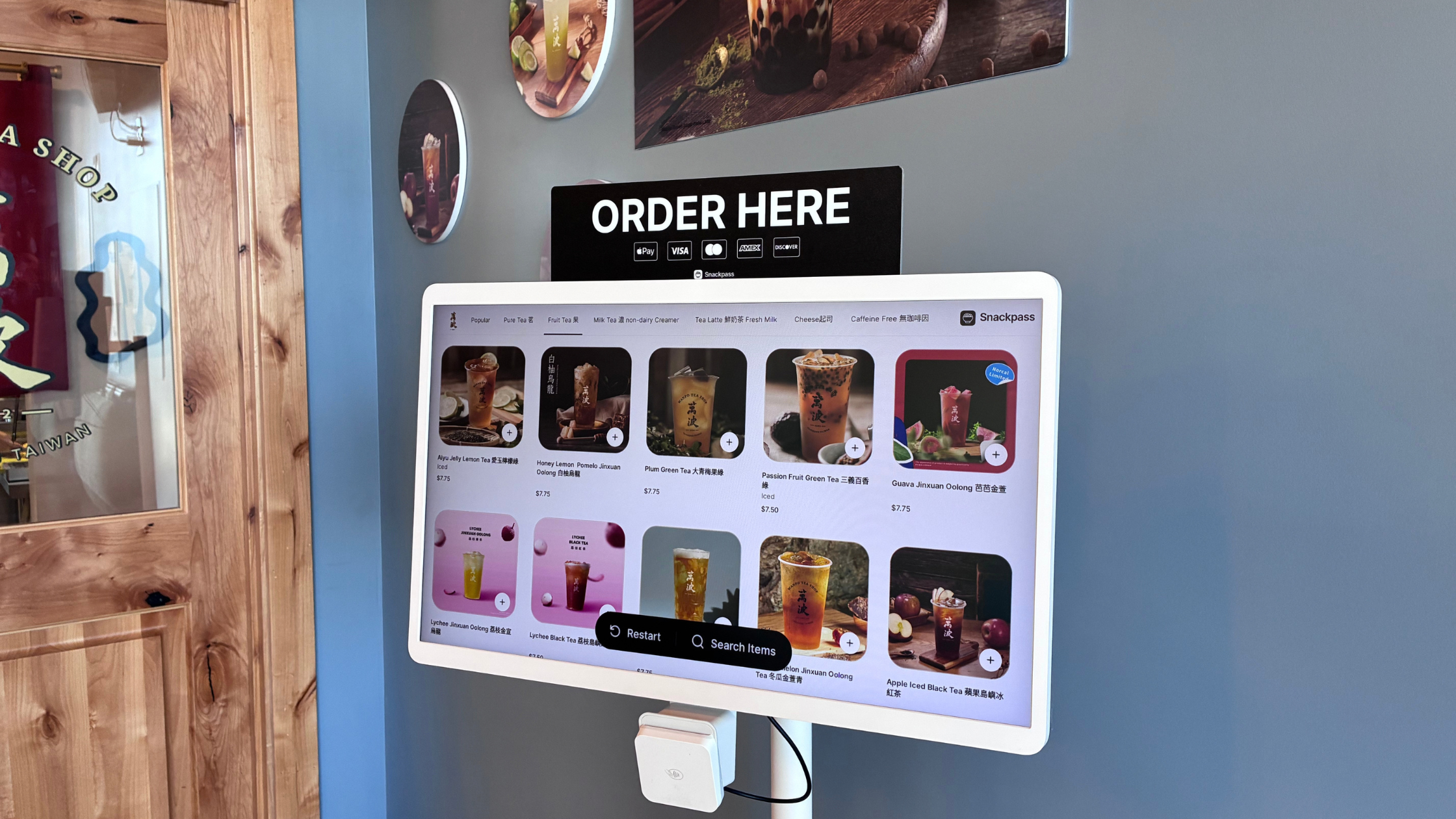 Self-order kiosk at Wanpo Tea in Ridgefield showing tea, sugar and ice options